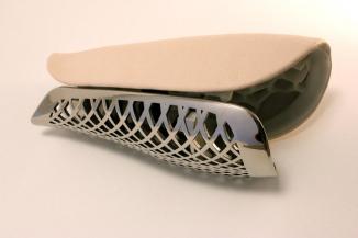 Bespoke Prosthetic Fairing - Link Pattern in Chrome and Leather